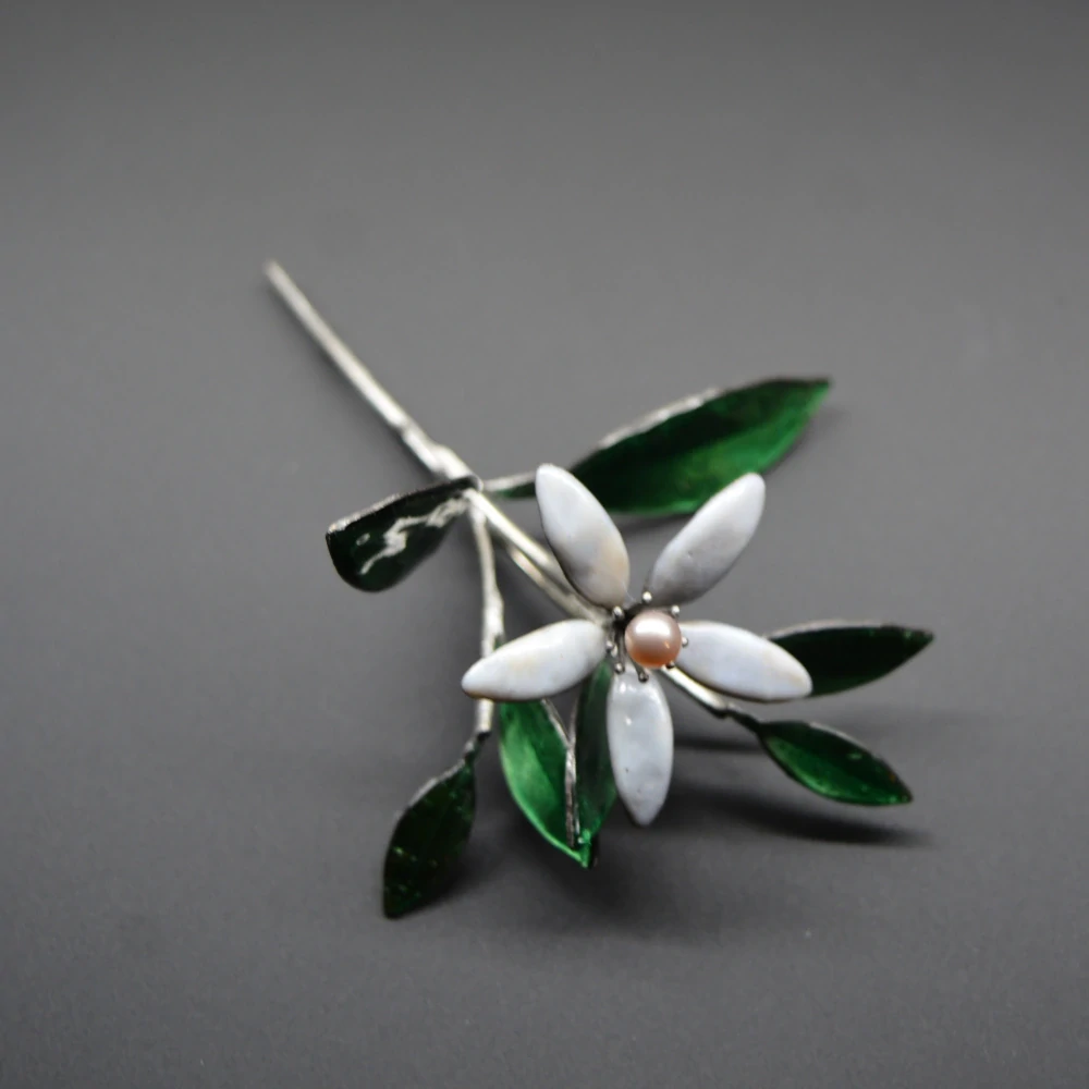 Brož květ pomerančovníku